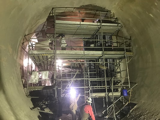relining the interior of a scrubber duct
